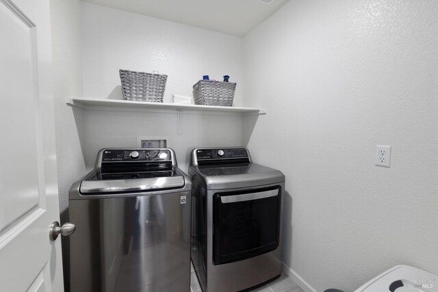 laundry room featuring independent washer and dryer