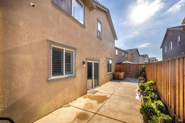 rear view of property with a patio area