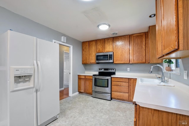 kitchen featuring sink and appliances with stainless steel finishes