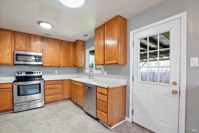 kitchen featuring sink and appliances with stainless steel finishes