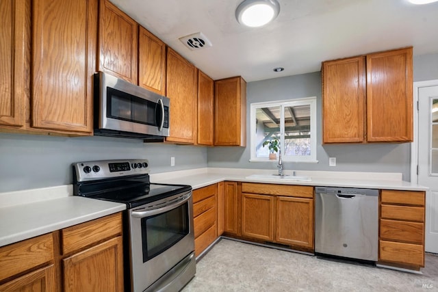 kitchen featuring sink and appliances with stainless steel finishes