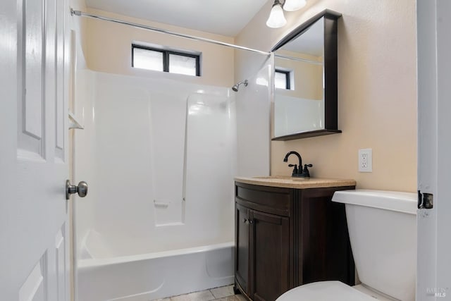 full bathroom with washtub / shower combination, toilet, and vanity