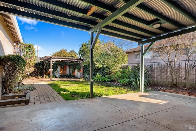 view of patio featuring a pergola