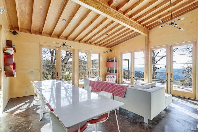 dining space featuring high vaulted ceiling, beamed ceiling, and french doors