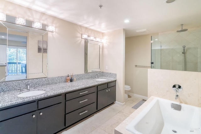 full bathroom featuring tile patterned floors, vanity, toilet, and separate shower and tub