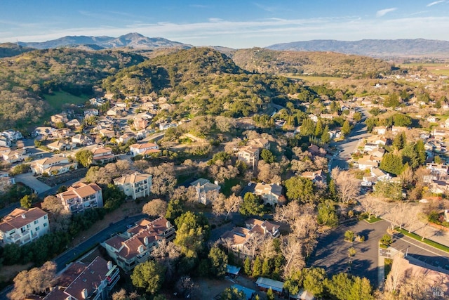 drone / aerial view with a mountain view and a residential view