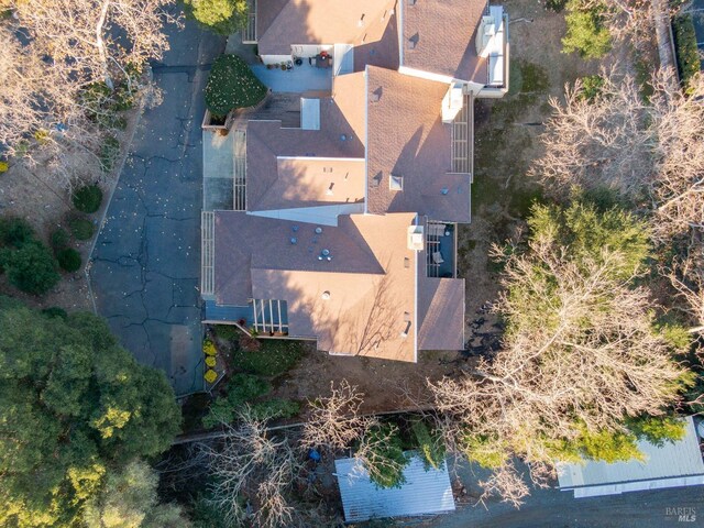 birds eye view of property featuring a mountain view