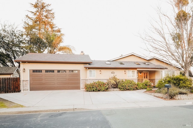 view of front of home featuring a garage