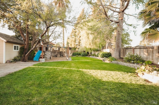 view of yard featuring a playground