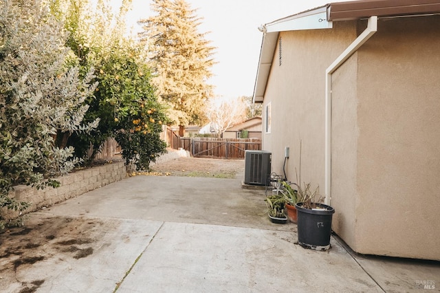 exterior space with a patio and central air condition unit