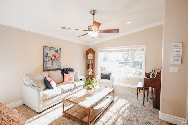 carpeted living room featuring ornamental molding, lofted ceiling, and ceiling fan