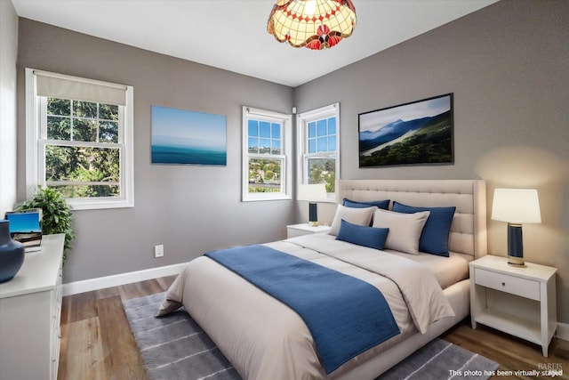 bedroom featuring dark hardwood / wood-style floors