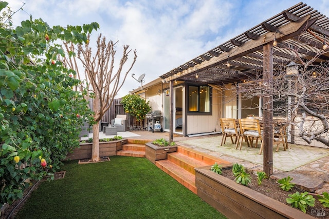 view of yard featuring a pergola and a patio area