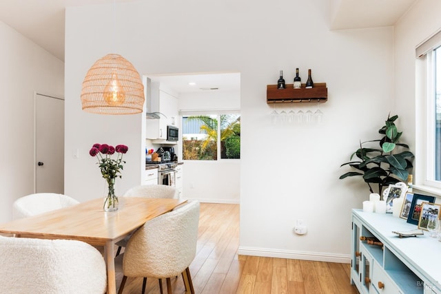 dining room featuring light hardwood / wood-style floors