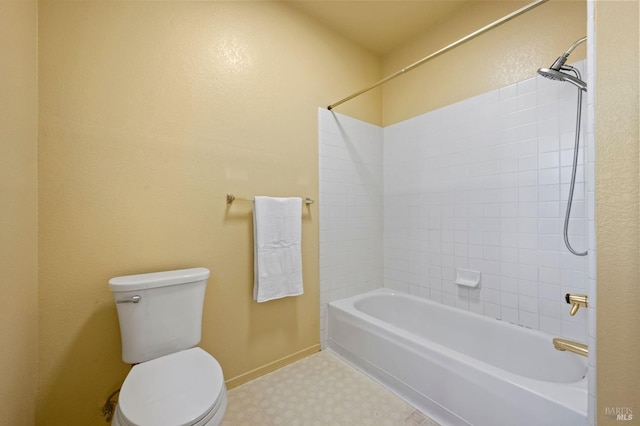 full bath featuring baseboards, shower / washtub combination, toilet, and tile patterned floors