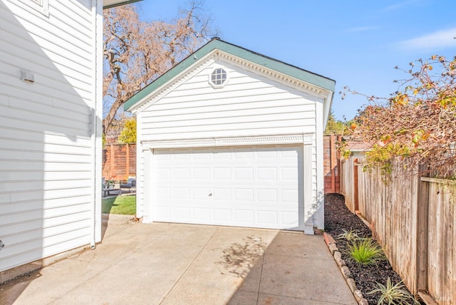 detached garage with fence