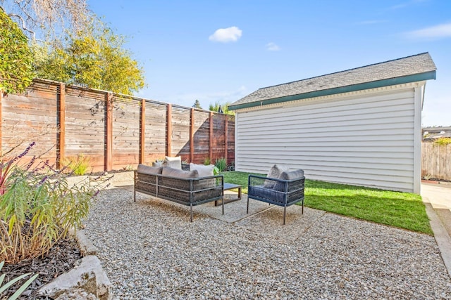 view of patio featuring a fenced backyard and an outdoor hangout area