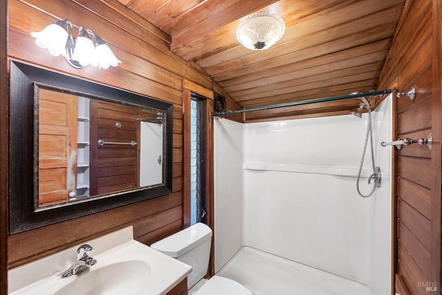 bathroom featuring a shower, wooden walls, wooden ceiling, and lofted ceiling