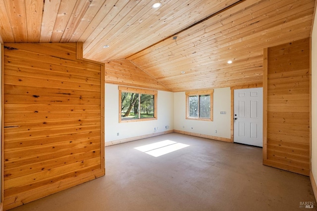 additional living space featuring wood walls, vaulted ceiling, carpet, and wood ceiling