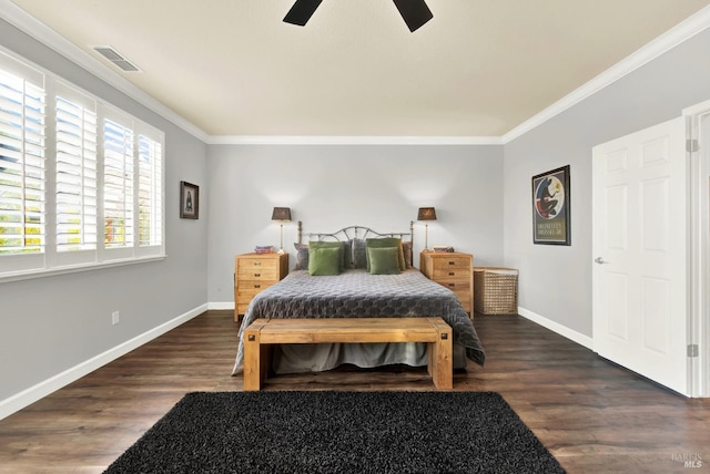 bedroom with crown molding, ceiling fan, and dark hardwood / wood-style flooring