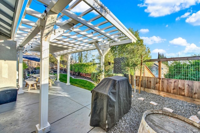 view of patio / terrace featuring a grill and a pergola