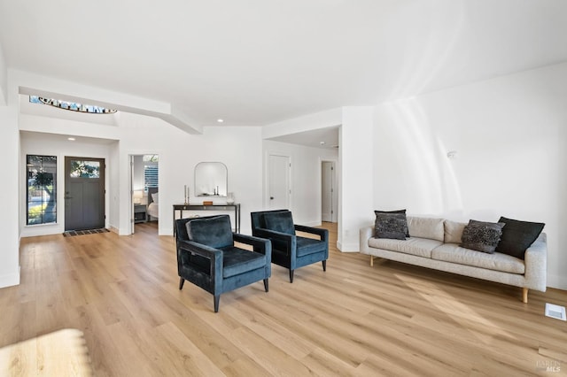 living room featuring light wood-type flooring