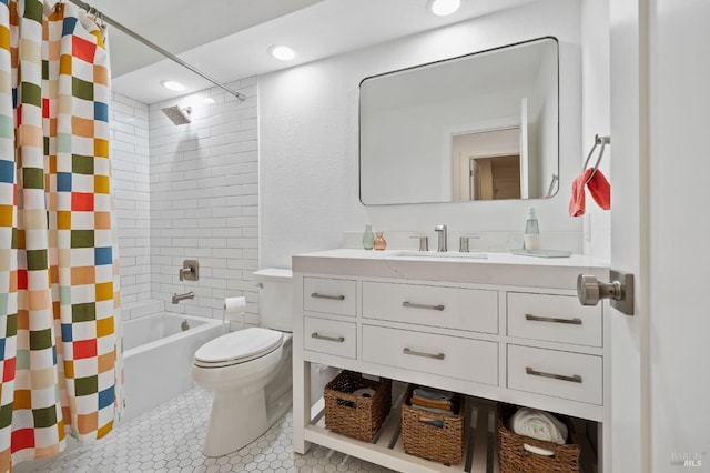 full bathroom with vanity, tile patterned floors, shower / bath combo with shower curtain, and toilet