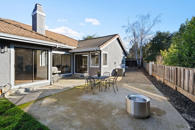 back of house with a patio area