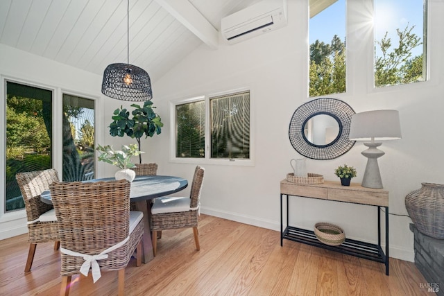 dining room featuring wood ceiling, lofted ceiling with beams, light hardwood / wood-style flooring, and a wall unit AC