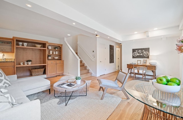 living room with light hardwood / wood-style flooring