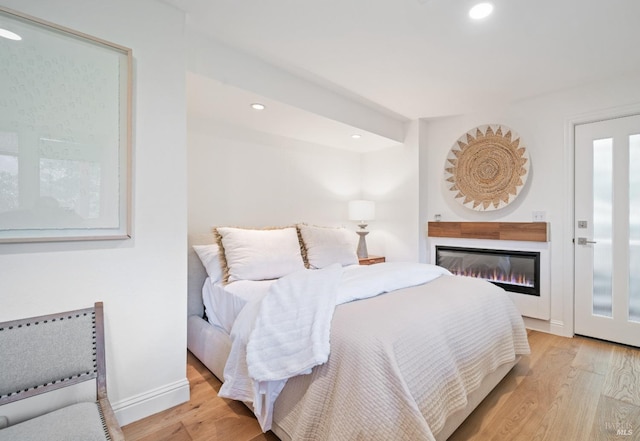 bedroom featuring light hardwood / wood-style flooring