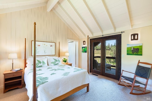 carpeted bedroom featuring french doors, access to outside, beam ceiling, high vaulted ceiling, and wooden walls