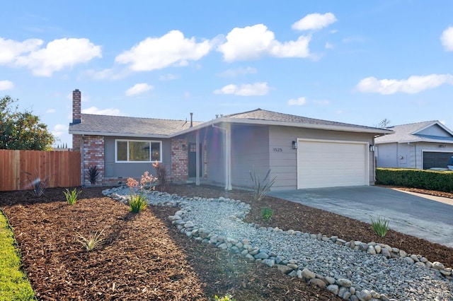 ranch-style home featuring a garage