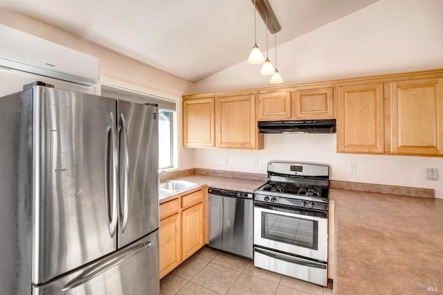 kitchen featuring appliances with stainless steel finishes, decorative light fixtures, sink, an AC wall unit, and lofted ceiling