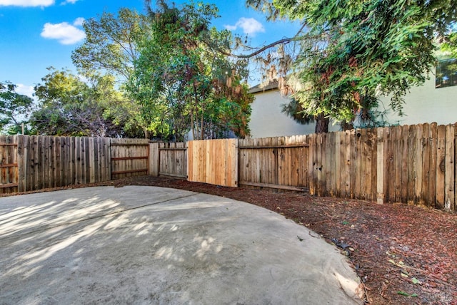 exterior space featuring a fenced backyard