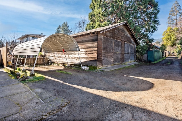 view of parking featuring a carport