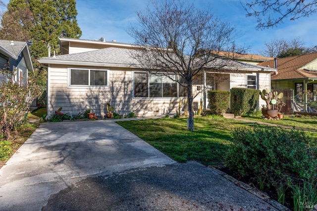 view of front of home with a front lawn