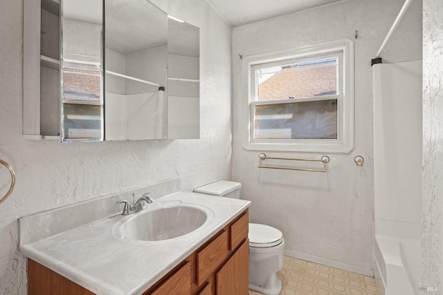 full bathroom with bathing tub / shower combination, toilet, and vanity