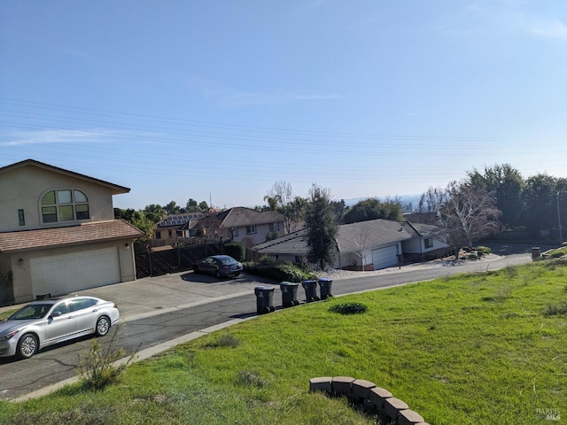 view of yard with a garage