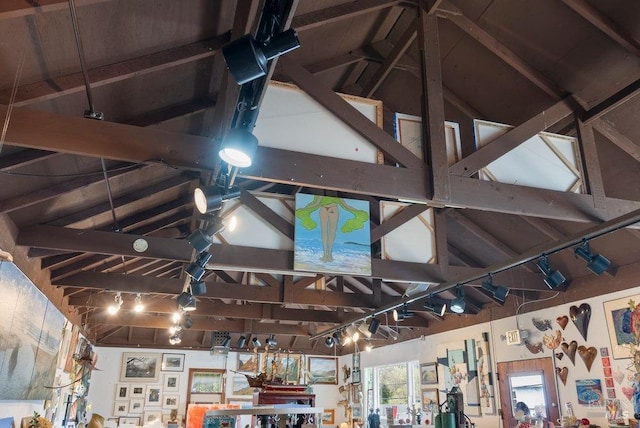 interior details with wooden ceiling, beamed ceiling, and a workshop area