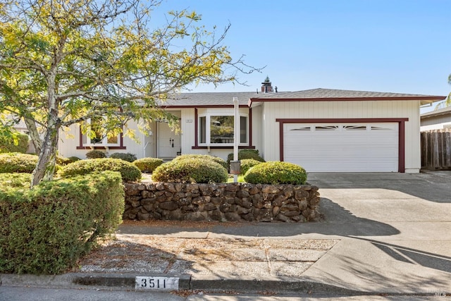 ranch-style home with a garage