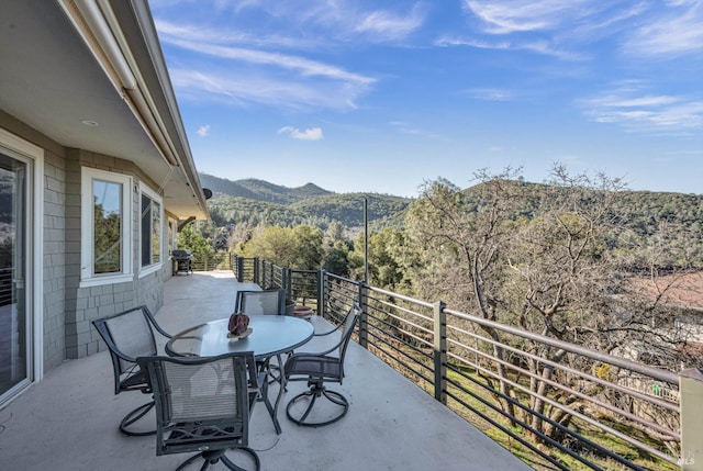 balcony featuring a mountain view