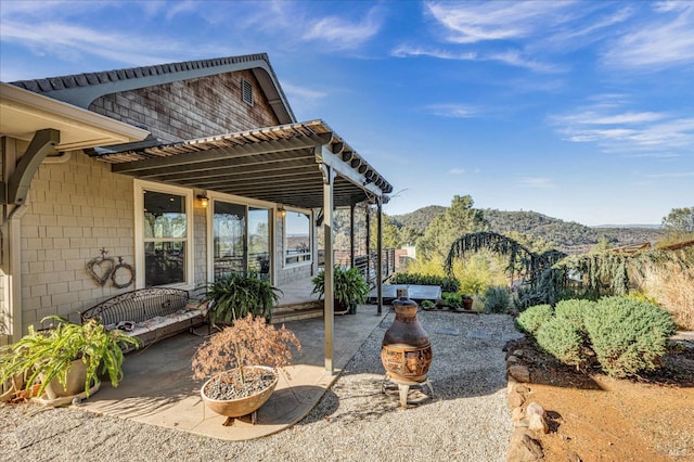 view of patio featuring a mountain view