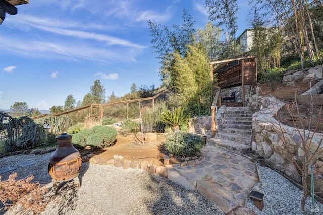 view of yard featuring a fire pit