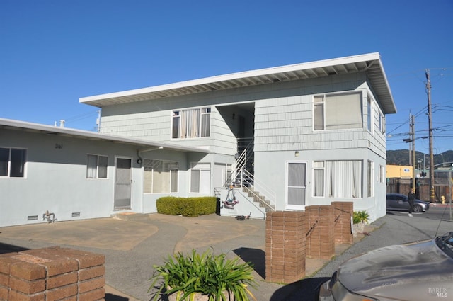 view of front of home with a patio