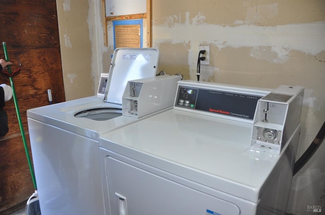 laundry area featuring independent washer and dryer