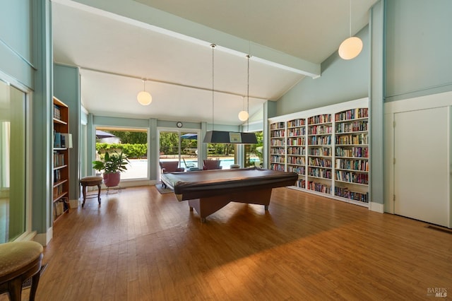 playroom with wood-type flooring, beam ceiling, high vaulted ceiling, and billiards