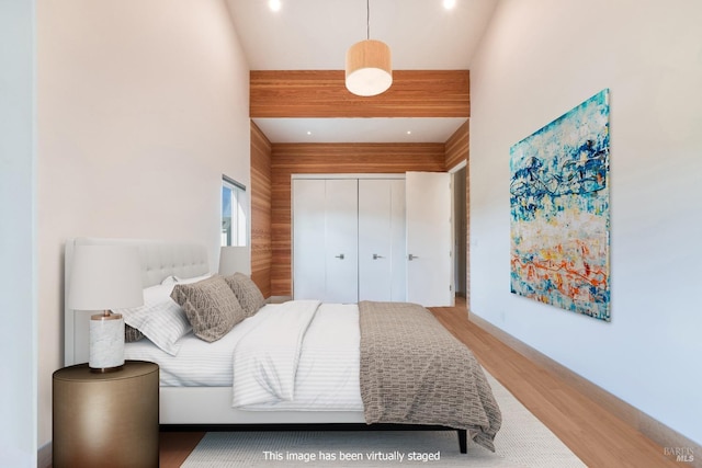 bedroom featuring a closet and hardwood / wood-style floors