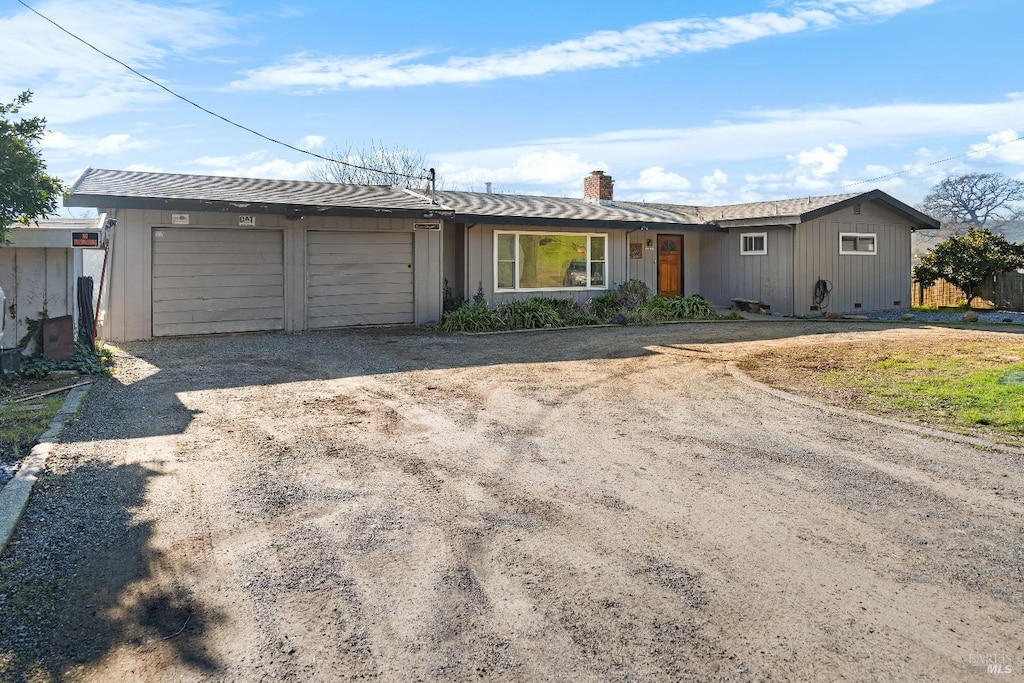 ranch-style house with a garage