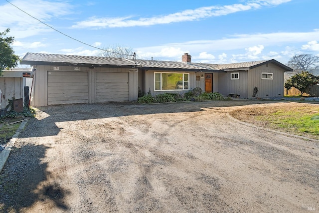 ranch-style house with a garage